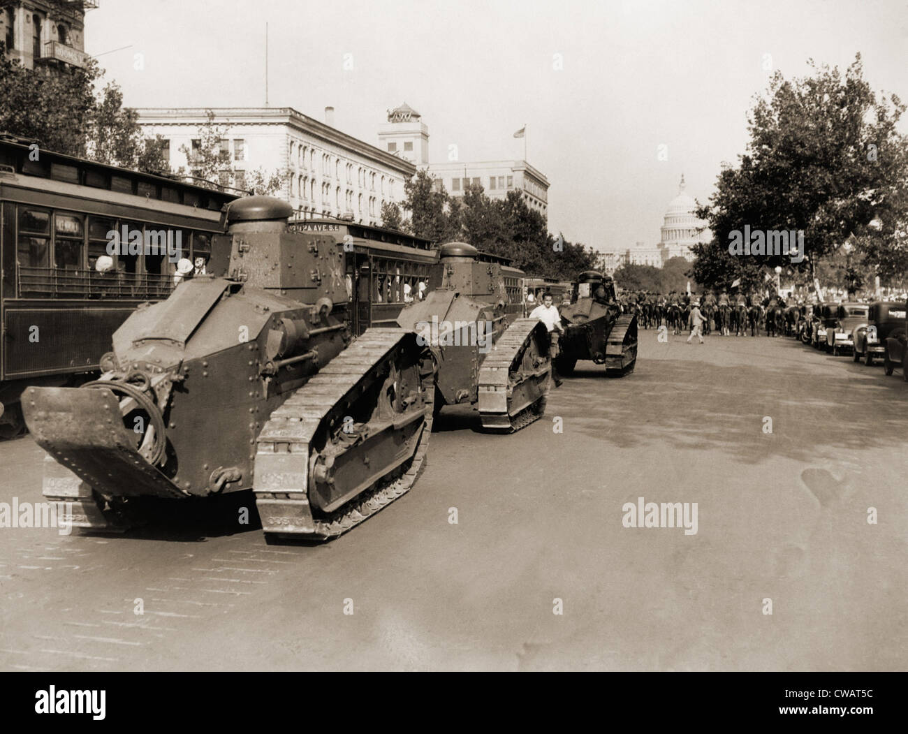 Small tanks are positioned along Pennsylvania Avenue allowing mounted police to hold their ground against Bonus Marchers. The Stock Photo
