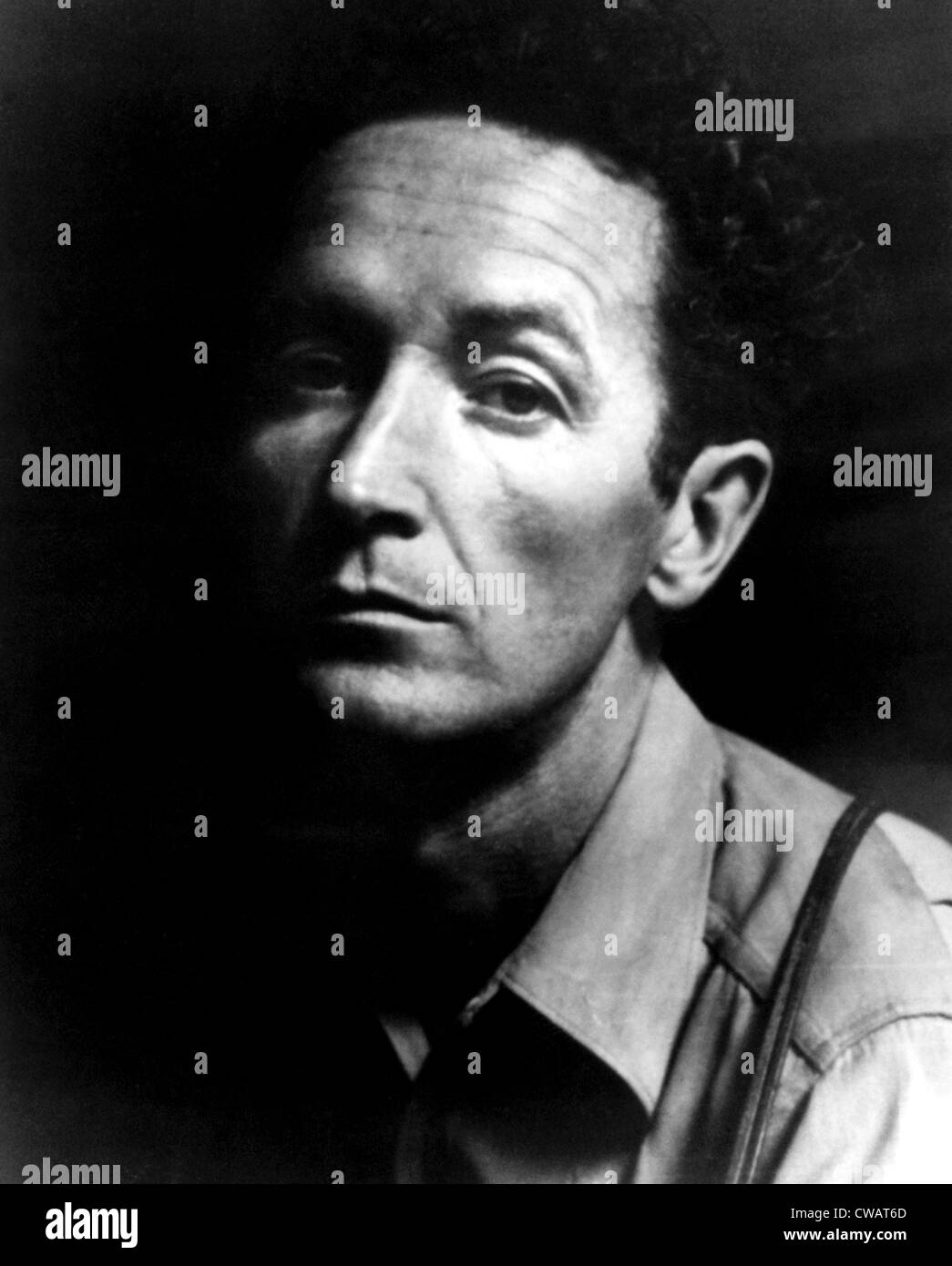 Folk singer Woody Guthrie, ca.1950s. Courtesy CSU Archives/Everett Collection. Stock Photo
