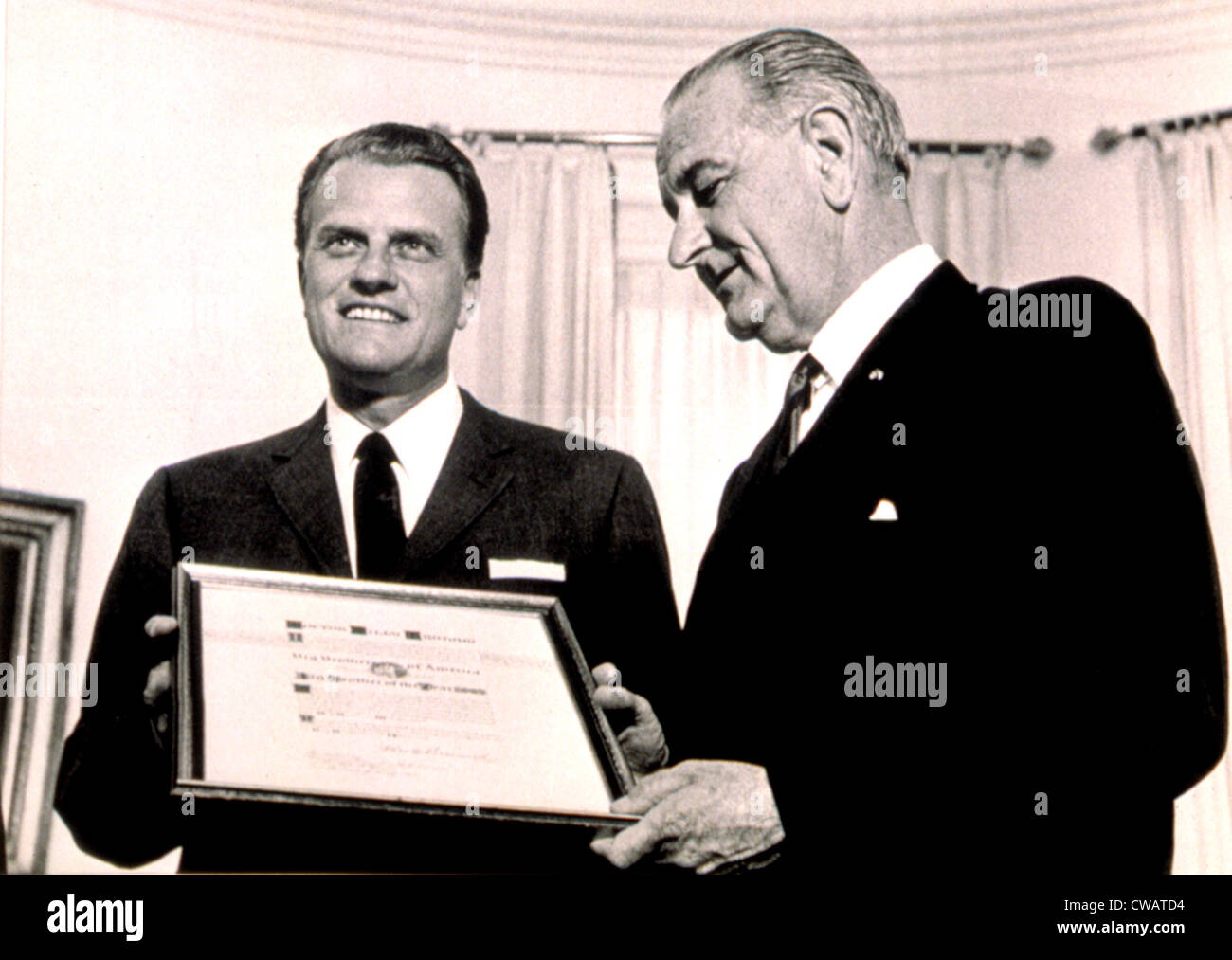 Billy Graham & President Lyndon B. Johnson awarding Graham Big Brother of the Year, White House, 5/10/66. Courtesy: CSU Stock Photo