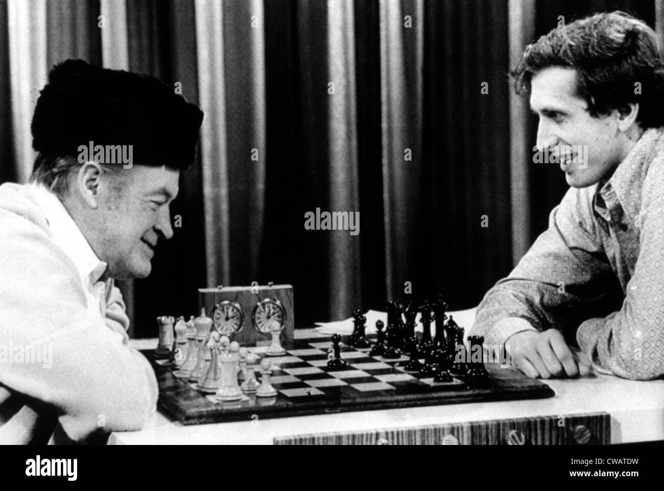 Bobby Fischer at Chess Board with Newspaper Bobby the Champ