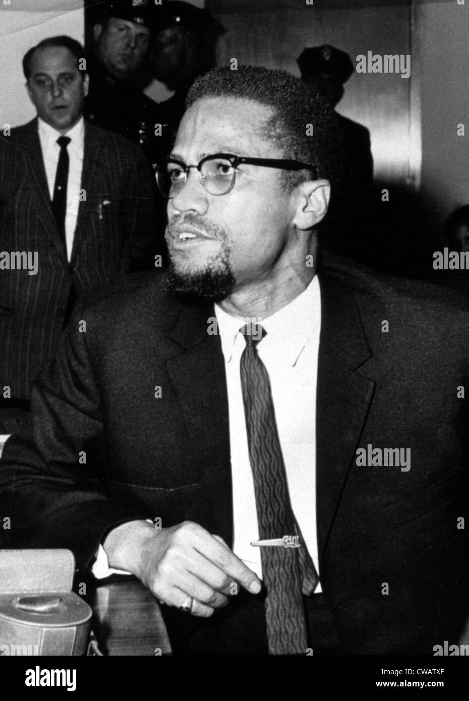 Malcolm X, during a press conference in New York, 11/24/64.. Courtesy: CSU Archives / Everett Collection Stock Photo