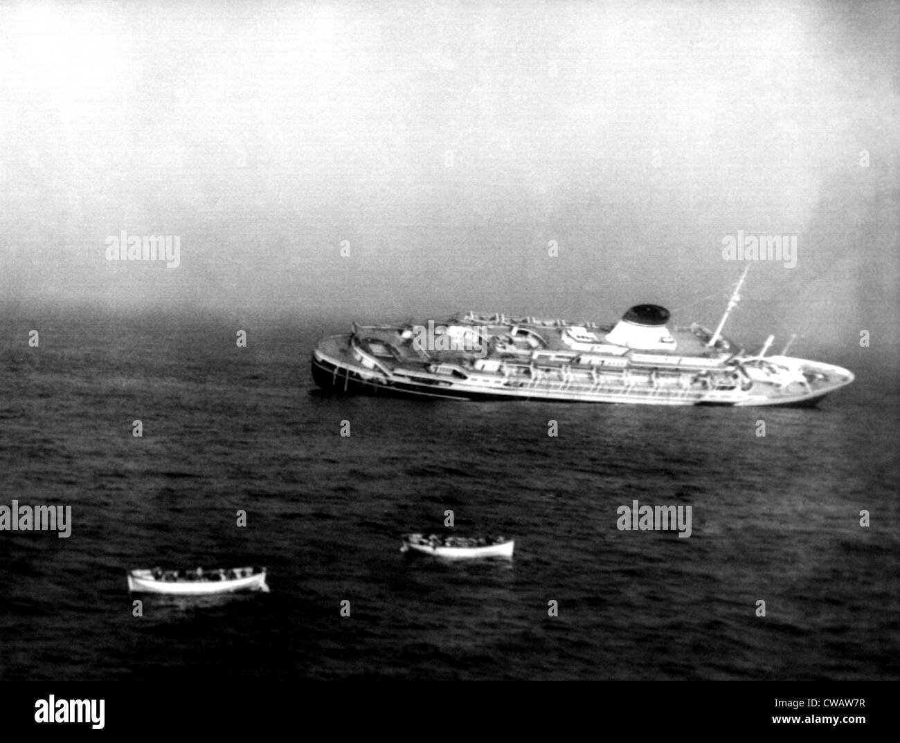 ANDREA DORIA, the Italian ocean liner is sinking in the ocean, 60 miles off of Nantucket Island, July 25, 1956, after its Stock Photo