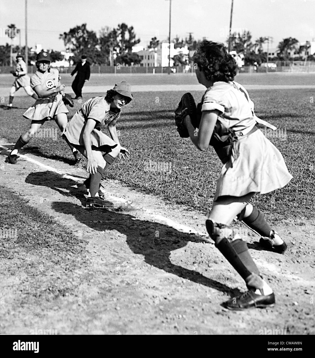 BASEBALL, Kenosha Comets play the Muskegon Lassies, 4/14/48. All-American Girls Baseball League.  Everett/CSU Archives. Stock Photo