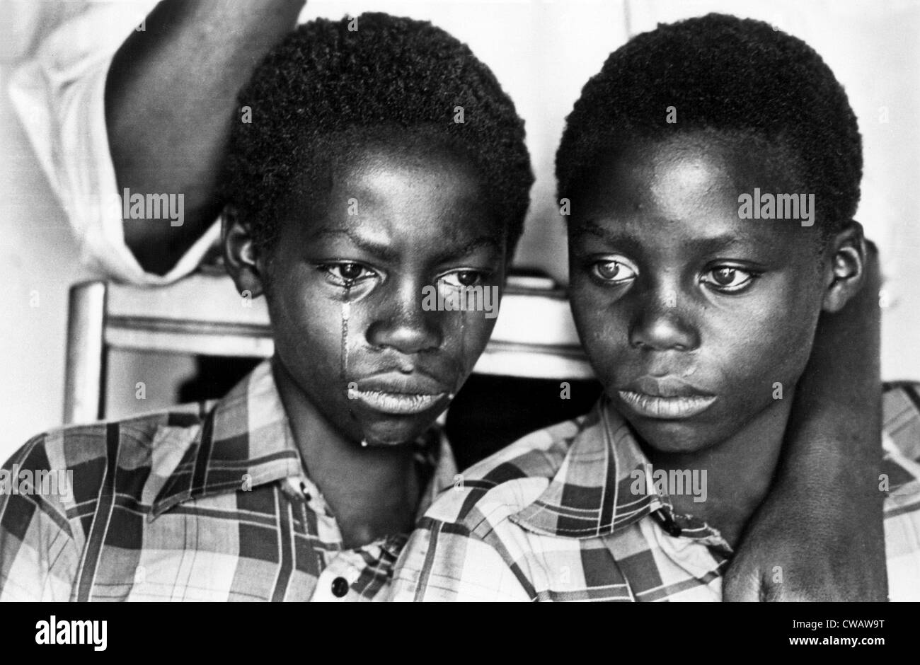 Two young men in South Africa, living under apartheid, by Peter Magubane.. Courtesy: CSU Archives / Everett Collection Stock Photo