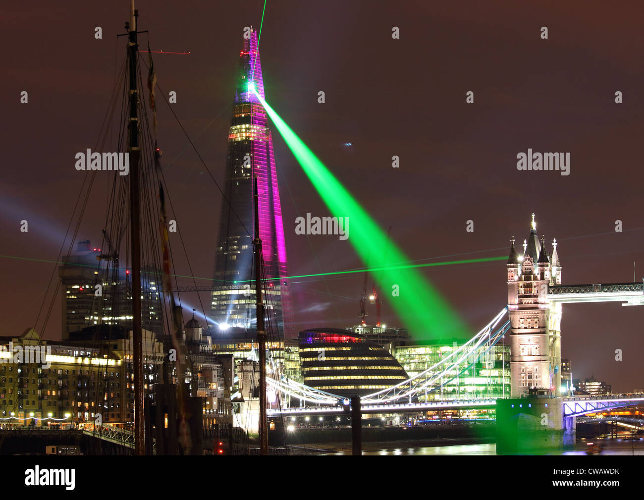 The Shard London sends a tractor beam over Tower Bridge. Stock Photo