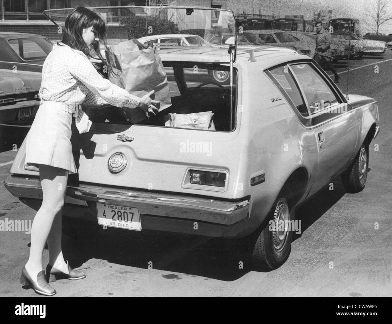 American Motors' The Gremlin, car owner placing grocery bags inside the rear lift-gate, April 9, 1970. Courtesy: CSU Stock Photo