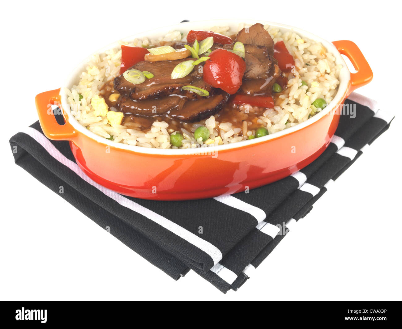 Authentic Stir-Fried Chinese Style Duck In Plum Sauce With Egg Fried Rice Meal, Isolated Against A White Background, With A Clipping Path, No People Stock Photo