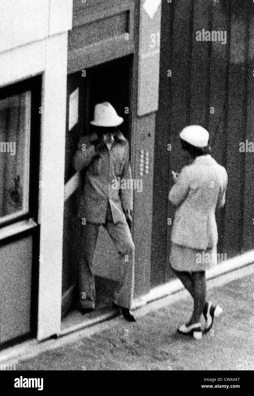 1972 Olympics, Black September terrorist Issa speaks with a West German policewoman, Olympic Village, Munich, Germany. Stock Photo