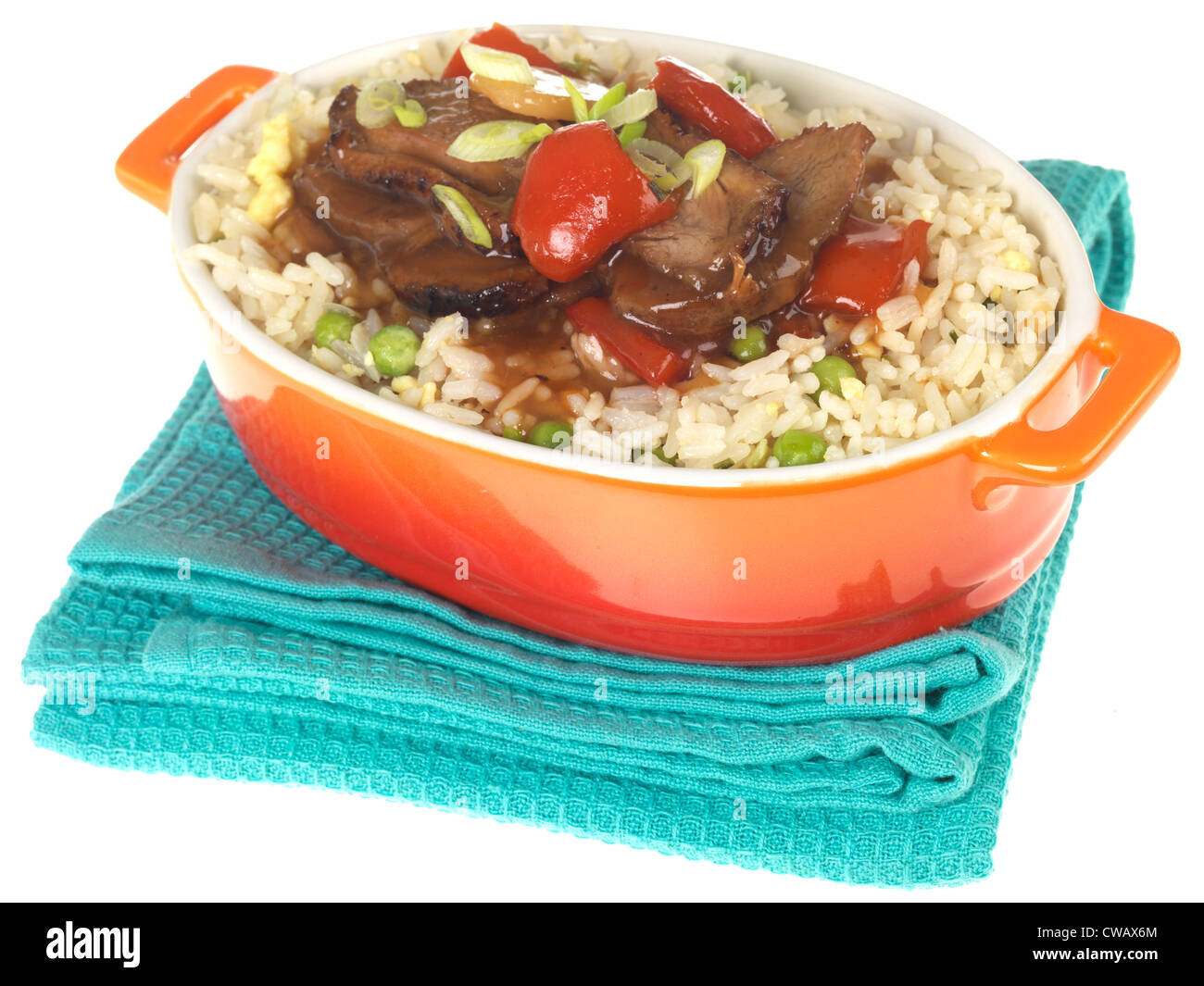 Authentic Stir-Fried Chinese Style Duck In Plum Sauce With Egg Fried Rice Meal, Isolated Against A White Background, With A Clipping Path, No People Stock Photo