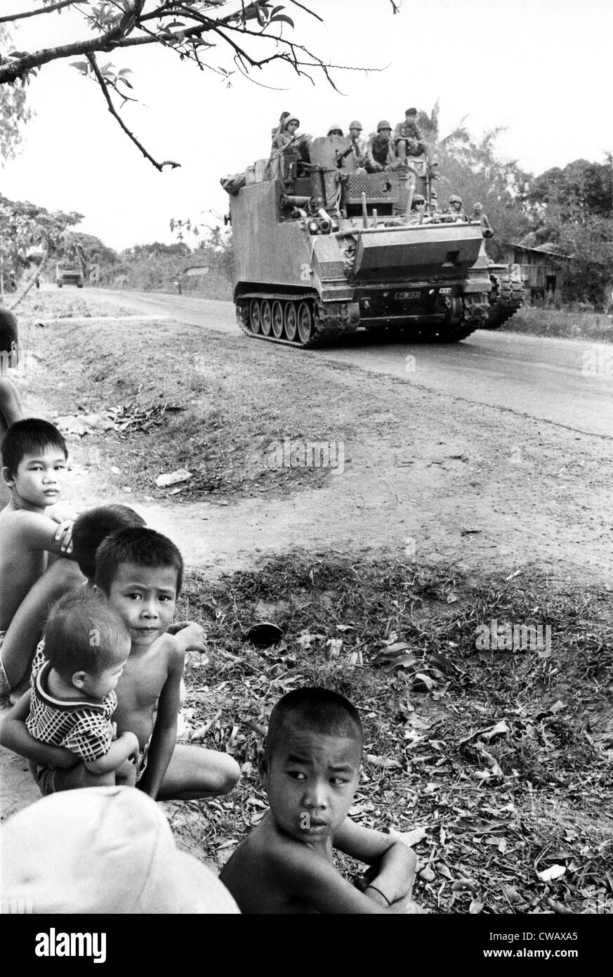 Highway 22, youngsters watch So.Vietnamese troops en route to Tay Ninh, 3/17/75.. Courtesy: CSU Archives / Everett Collection Stock Photo