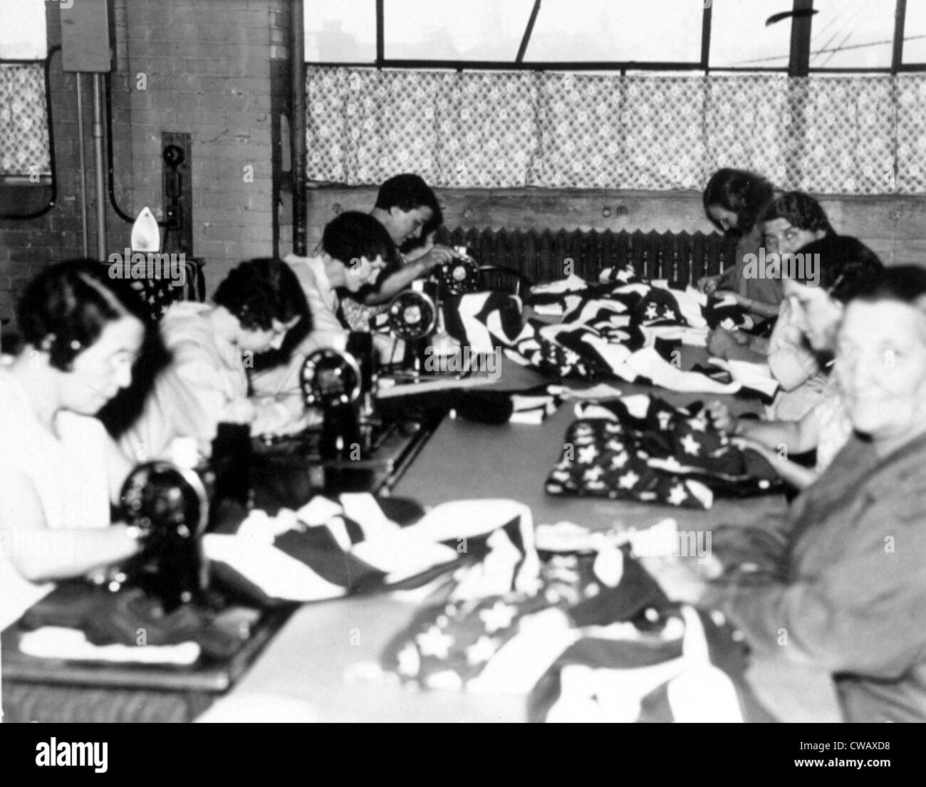 WPA Seamstresses making flags, Grand Rapids, Michigan, 1937.. Courtesy: CSU Archives / Everett Collection Stock Photo