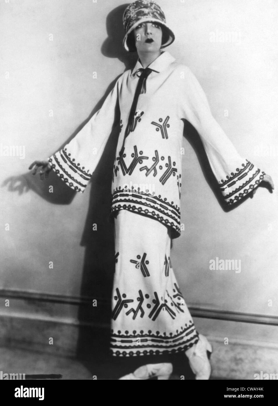 Two-piece twill costume with applique and embroidery for summer, 1922. Photo: Courtesy Everett Collection Stock Photo