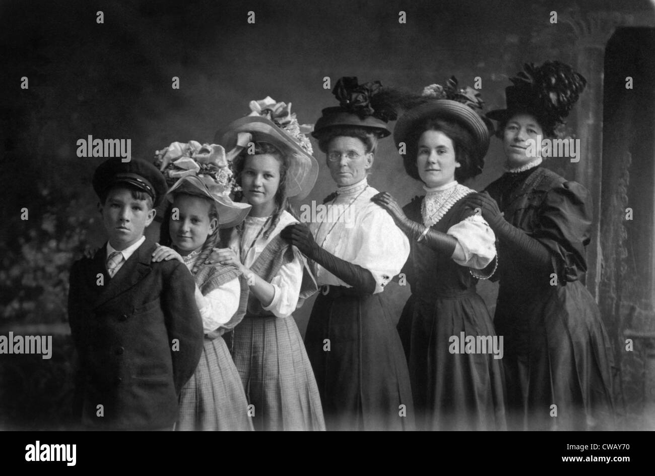 Three women and three children wearing hats, circa 1900. Photo: Courtesy Everett Collection Stock Photo