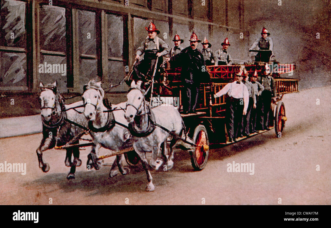 Horse-drawn fire engine on the way to a fire, c. 1890. Stock Photo