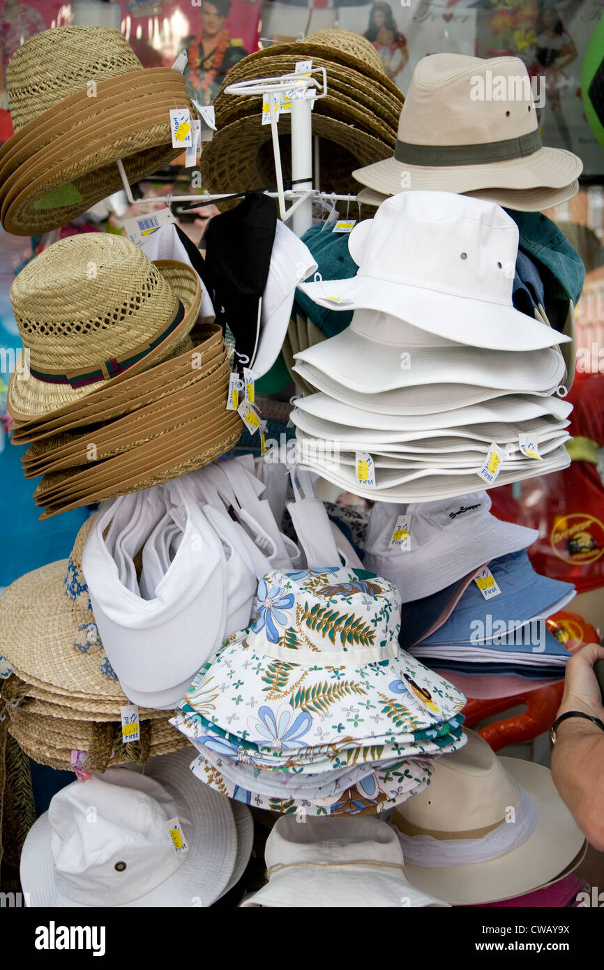Selection of summer hats on sale outside a shop. Stock Photo