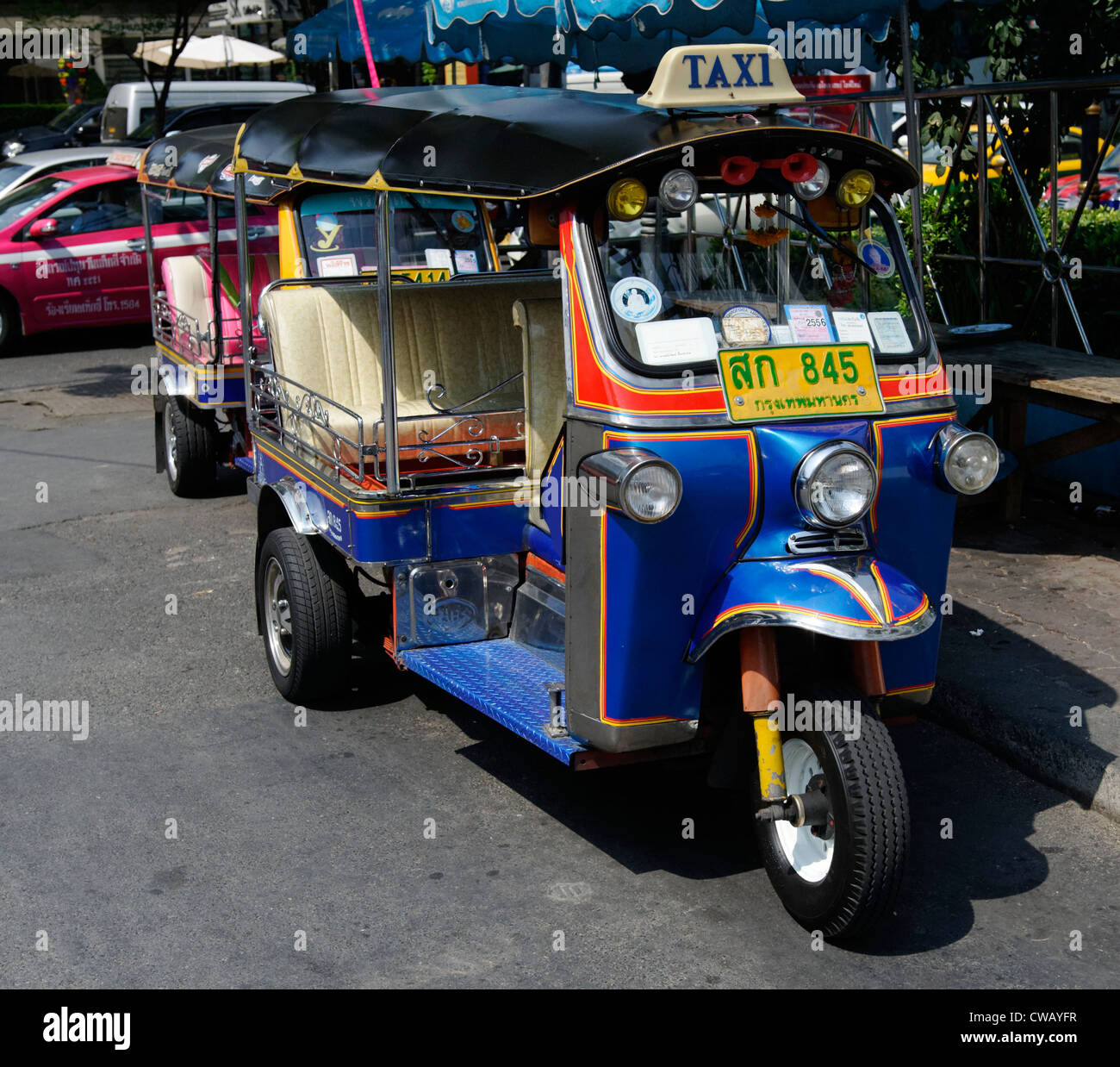 Blue tuk-tuk (tut-tut) in Bangkok, a common form of taxi for public  transport Stock Photo - Alamy