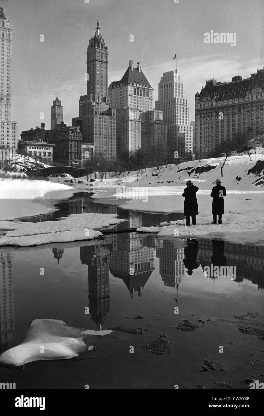 New York City, plaza buildings reflected over park lake, photograph by Samuel H. Gottscho, February 12, 1933. Stock Photo