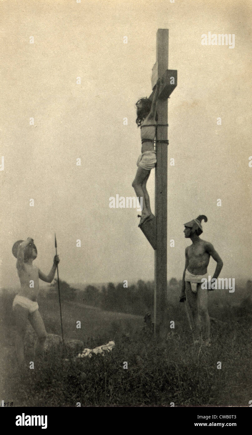 Jesus Christ, the Crucifixion in profile, with two Roman Soldiers, platinum print photograph by F. Holland Day, 1898. Stock Photo