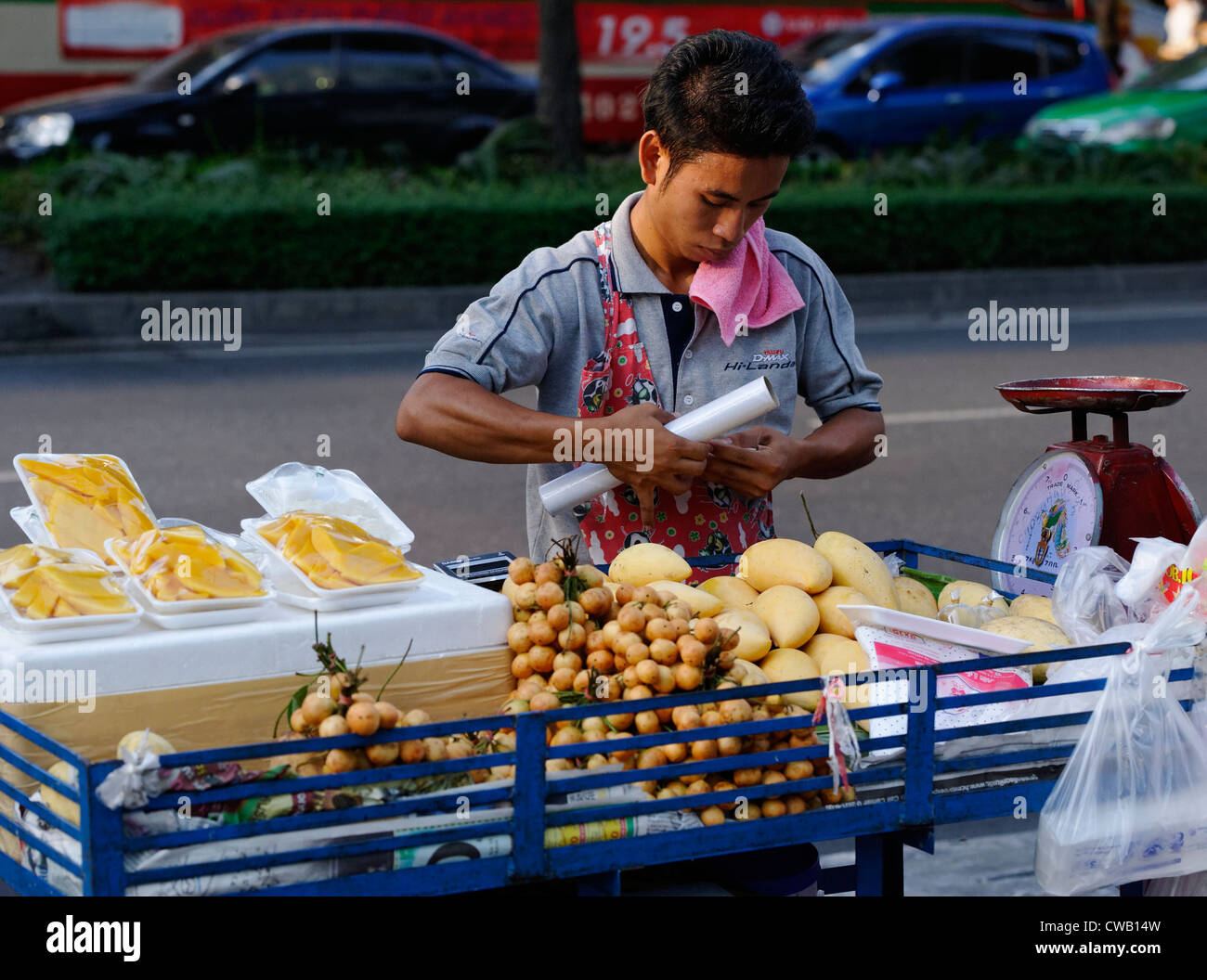 Hawker stall selling fruits and food on the streets of bangkok Stock