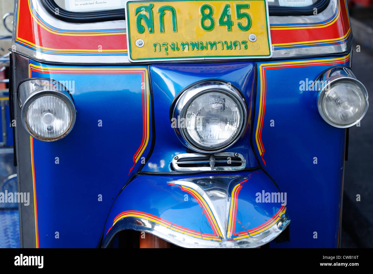 Blue tuk-tuk (tut-tut) in Bangkok, a common form of taxi for public transport. Stock Photo