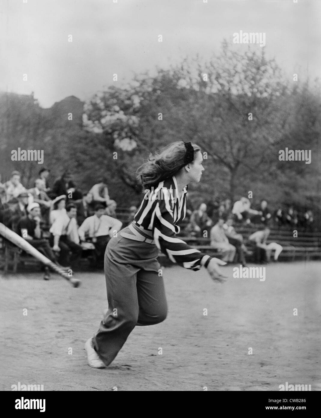 New York City, woman playing softball with other members of Othello production, Central Park, circa 1943-1944. Stock Photo