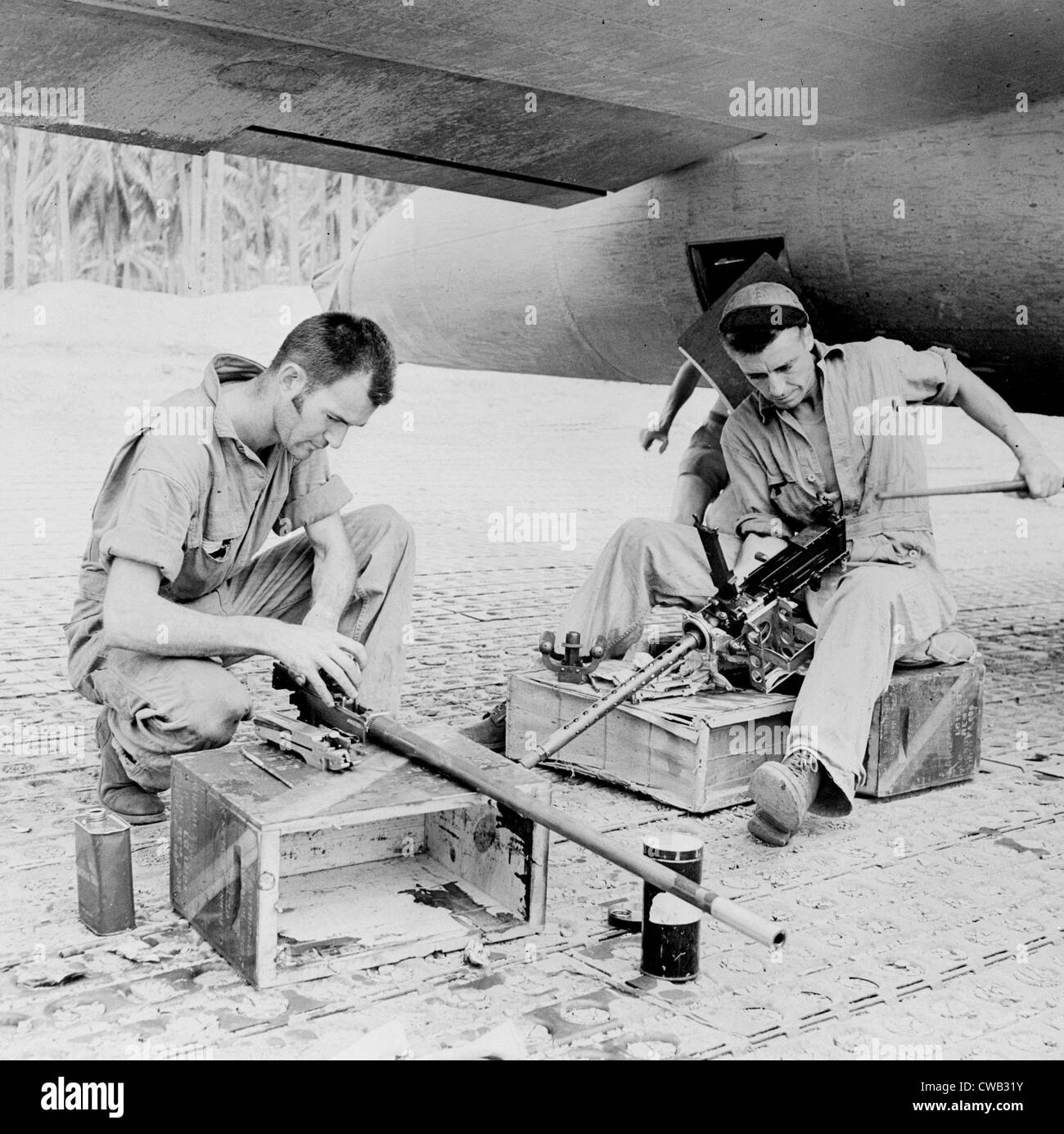 World War II, Sergeant Edward T. Spetch, Sergeant Vernon Nelson, Flying Fortress gunners carefully clean their .50 caliber Stock Photo
