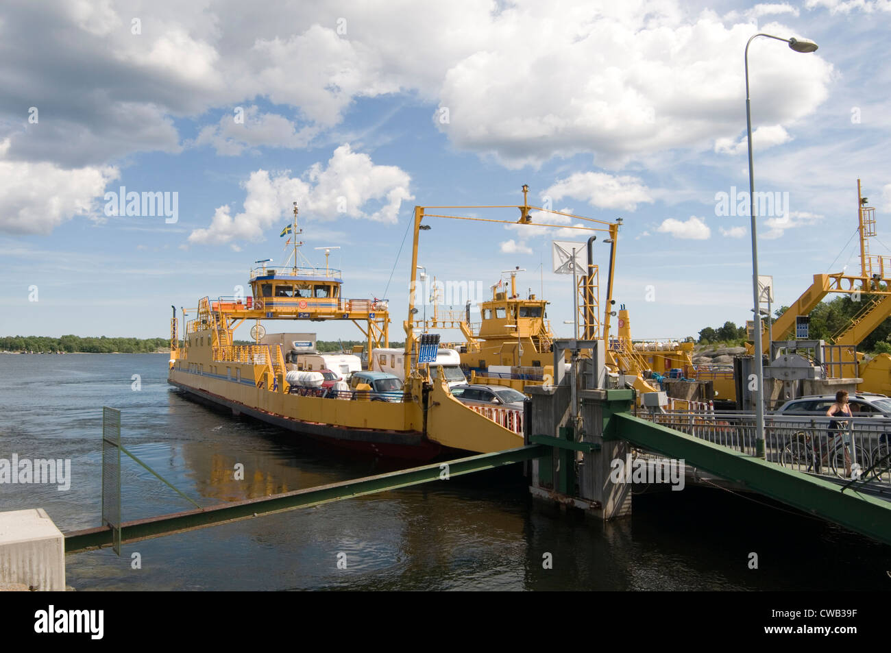 oregrund ferry cable ferries between sweden and Gräsö small island near ousthammer swedish car cars loading boarding embarking d Stock Photo
