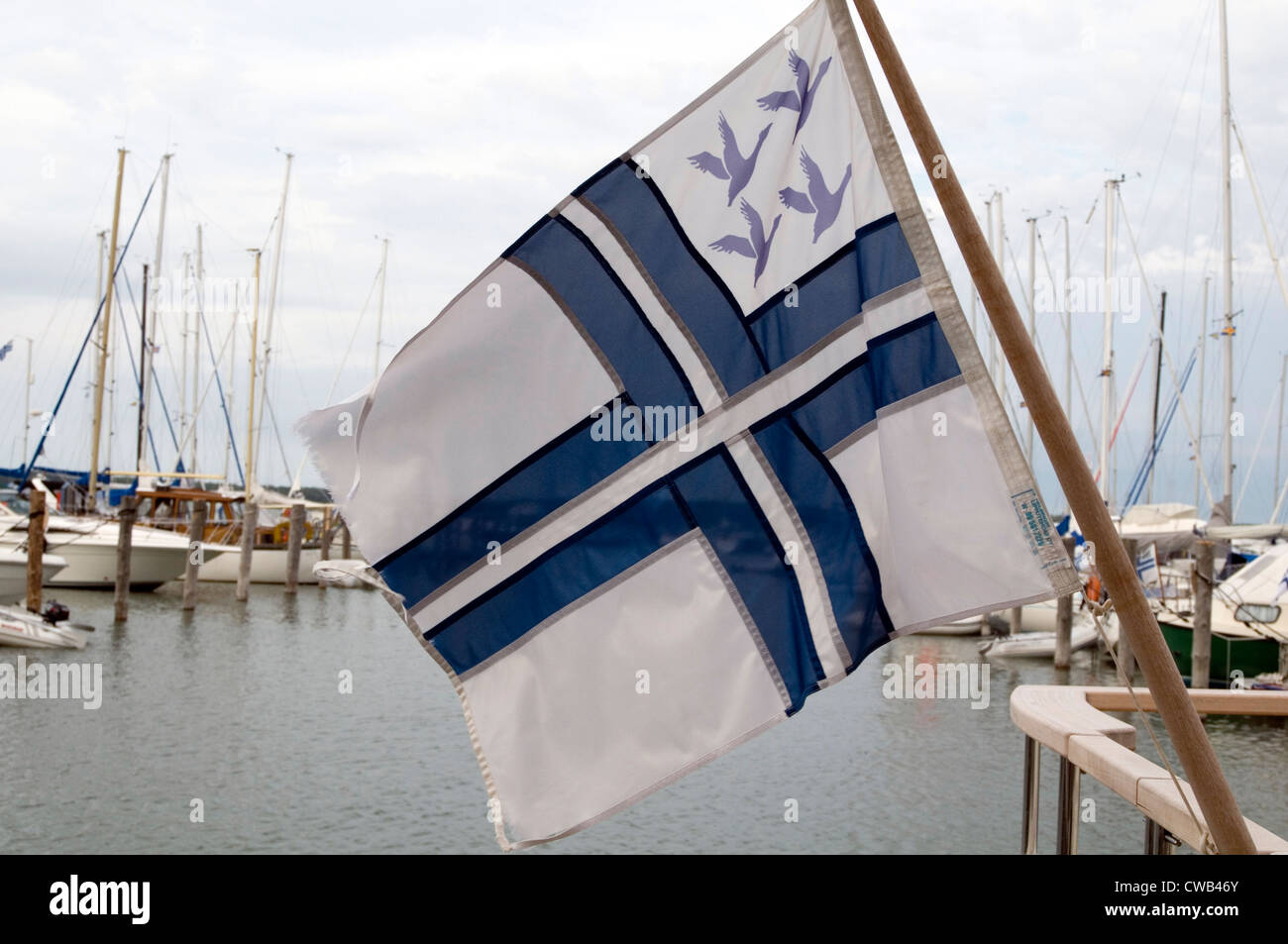 finland Yacht Ensign flag flags soumi boating boat boats flying Stock