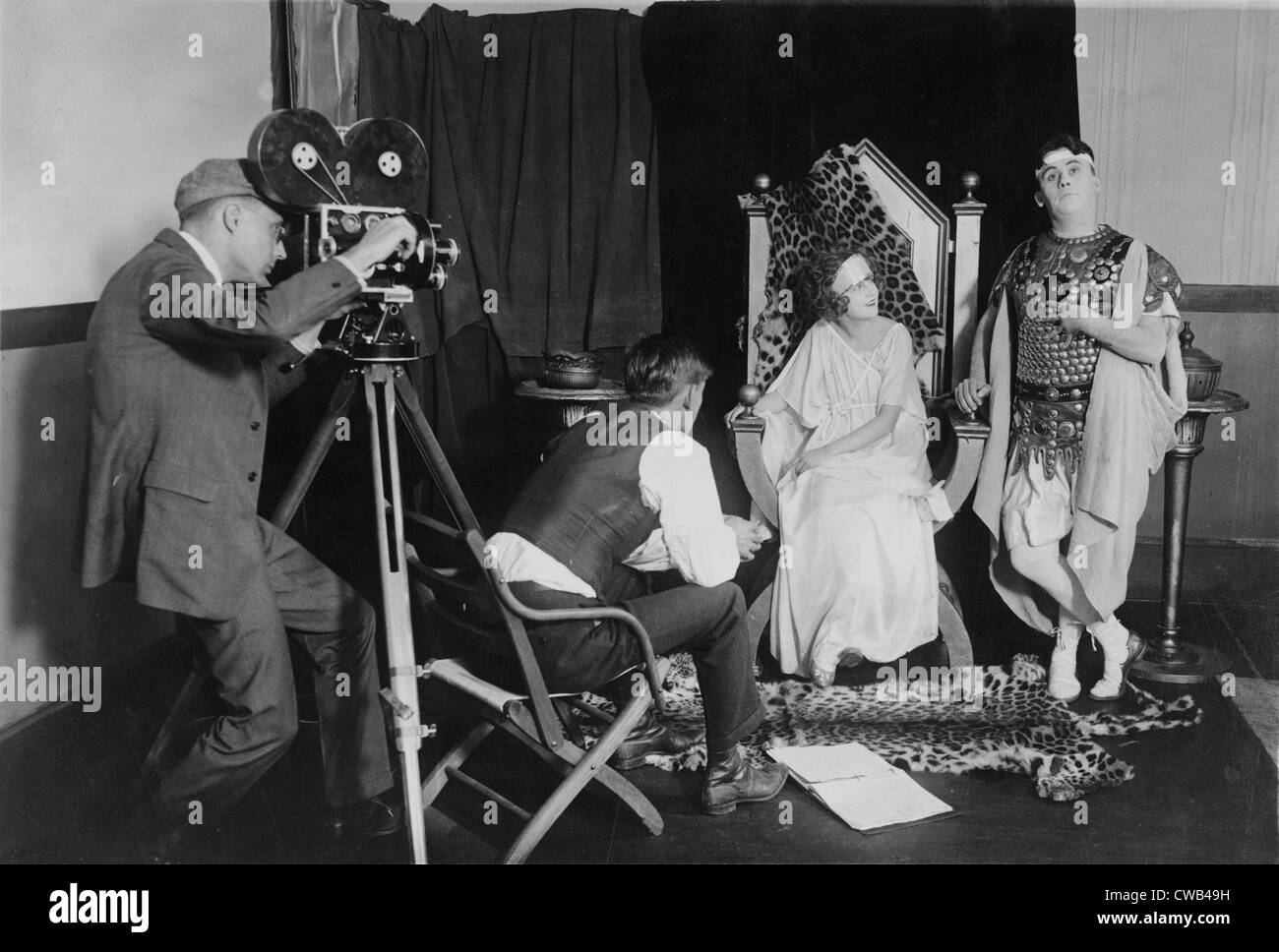 Margaret Gorman (second from right), who was crowned Miss America of 1921, being filmed for a burlesque on the burning of Rome Stock Photo