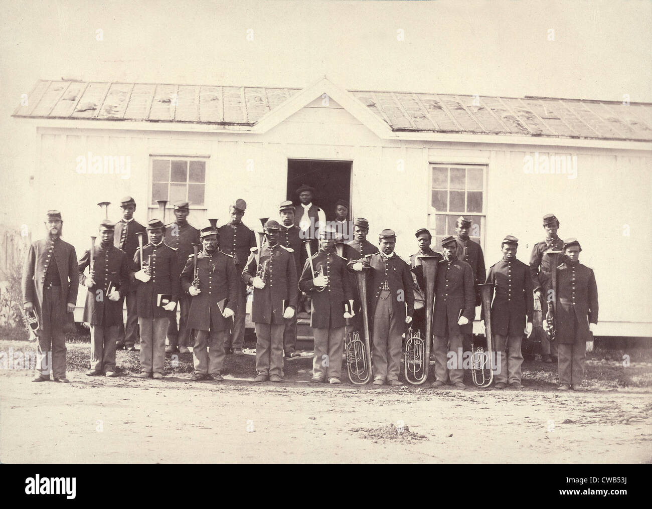 The Civil War, group of 21 African American men holding musical instruments, title: 'Band of 107th U.S. Colored Infantry', Stock Photo