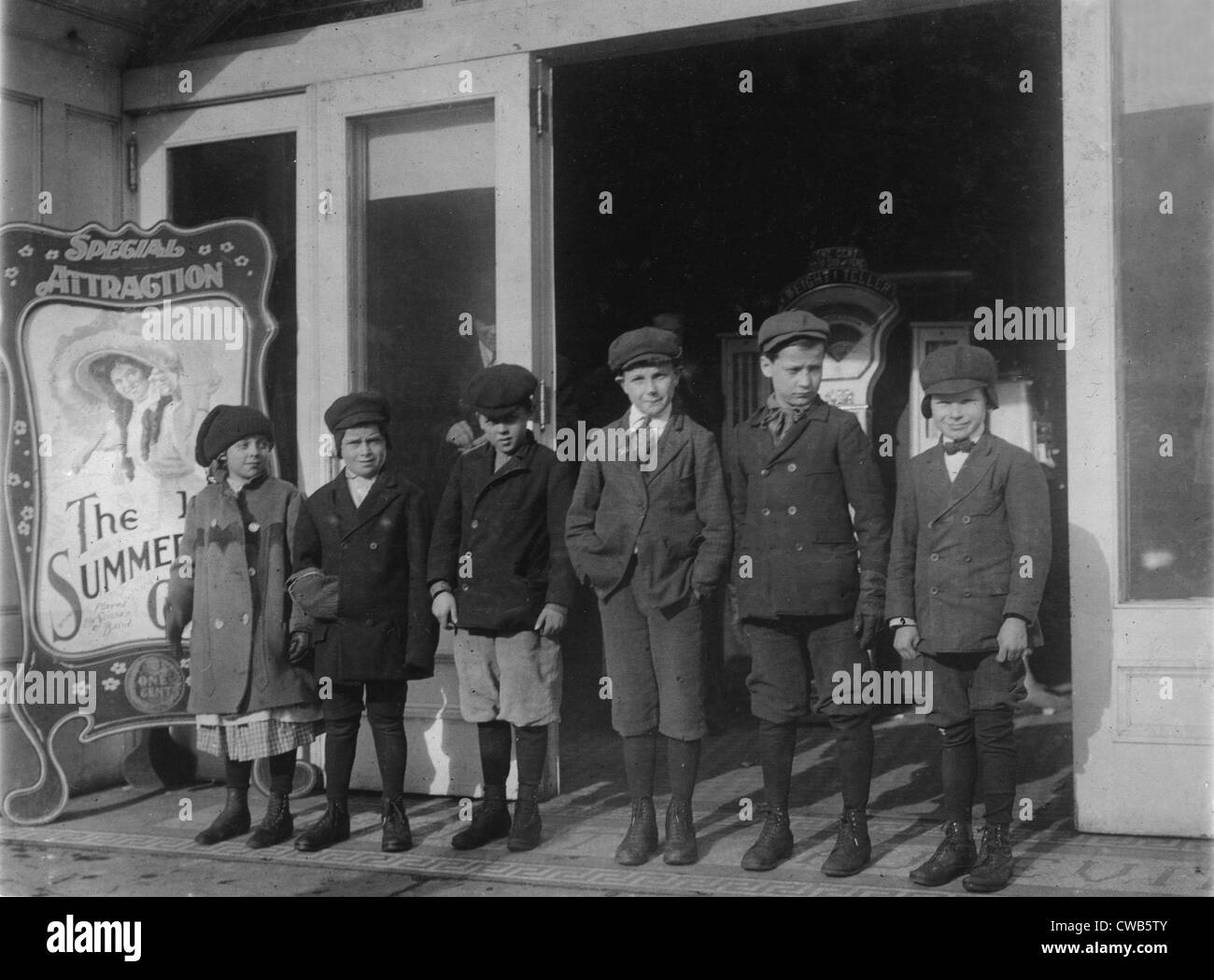 Children at a penny arcade, original caption: 'Line of children found in a penny arcade at 1:30 P.M. As many of the schools in Stock Photo