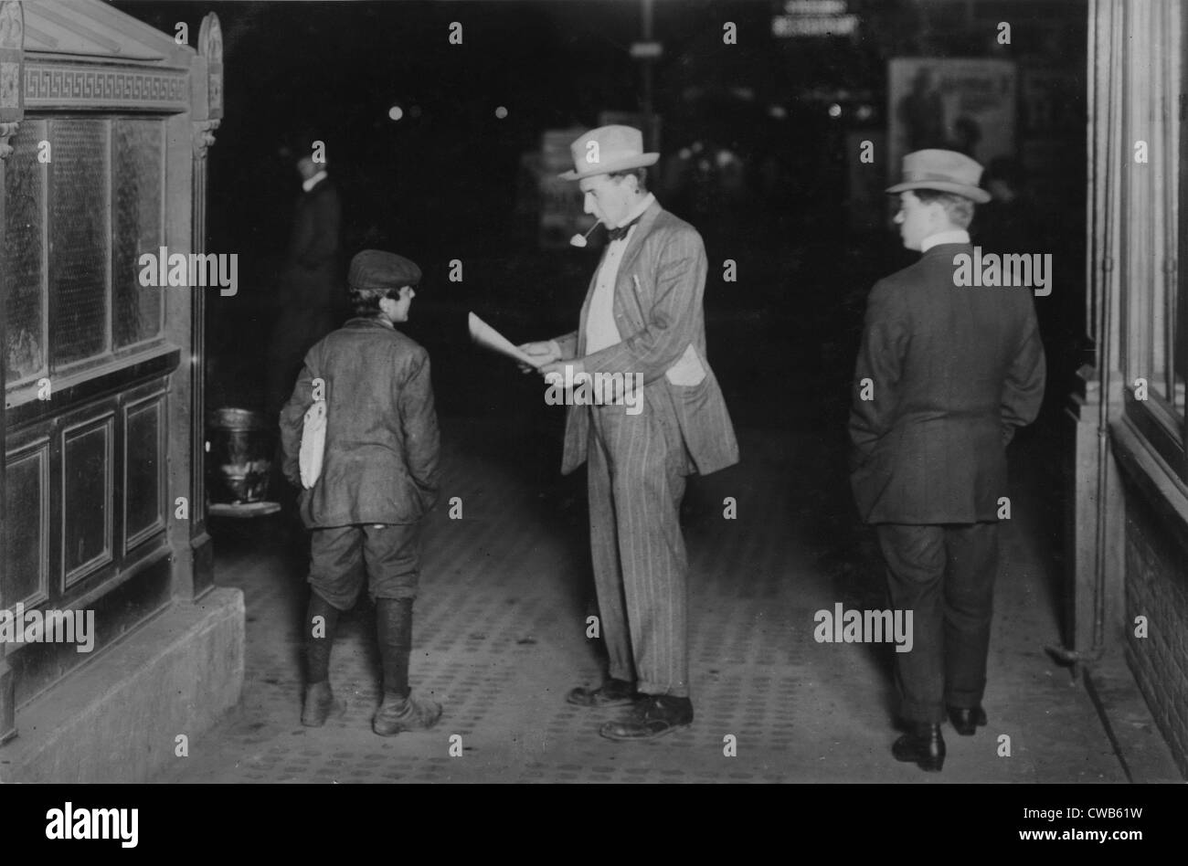 Child labor, original caption: 'Tony Spappos, 349 W. 39th St., N.Y., Selling papers at 10 P.M. at 50th Street & Broadway. About Stock Photo