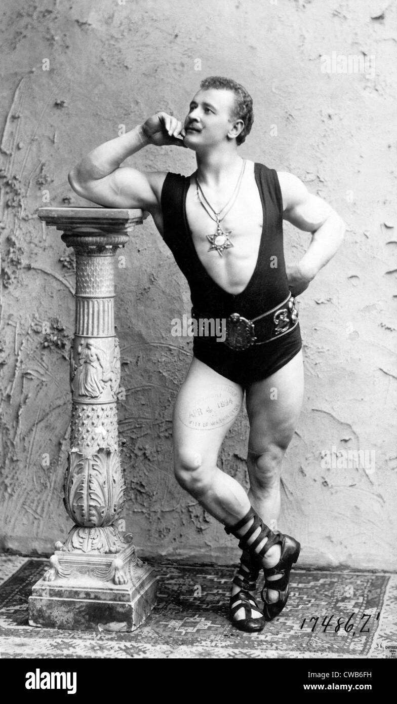 Eugen Sandow (1867-1925) strong man and body builder, wearing wrestling leotard and leaning on column. Photo c. 1894 Stock Photo