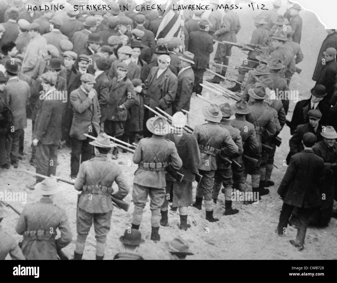Lawrence Textile Strike. Massachusetts militiamen with fixed bayonets surround a parade of strikers, Lawrence, Mass. January, Stock Photo