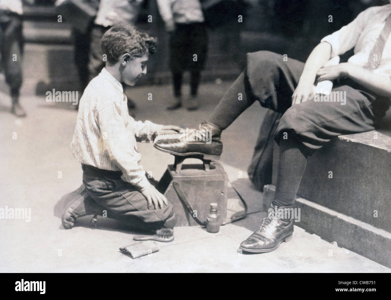 Child labor, Bootblack near City Hall Park, New York City. photograph by Lewis Wickes Hine, July, 1924 Stock Photo