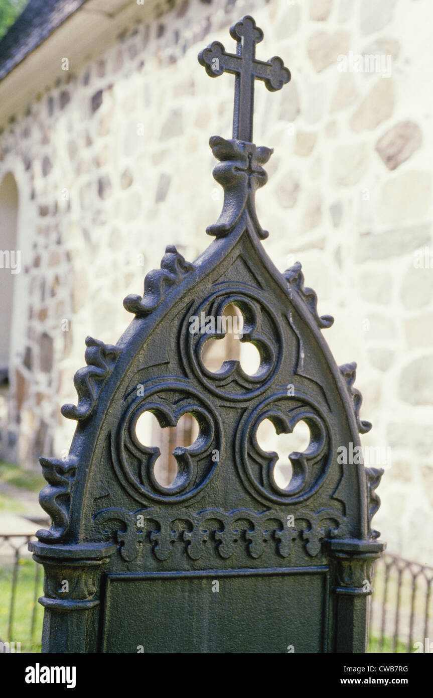 Detail of a metal grave marker next to the medieval Church of St. Mary in Raseborg (Pohja), Finland Stock Photo