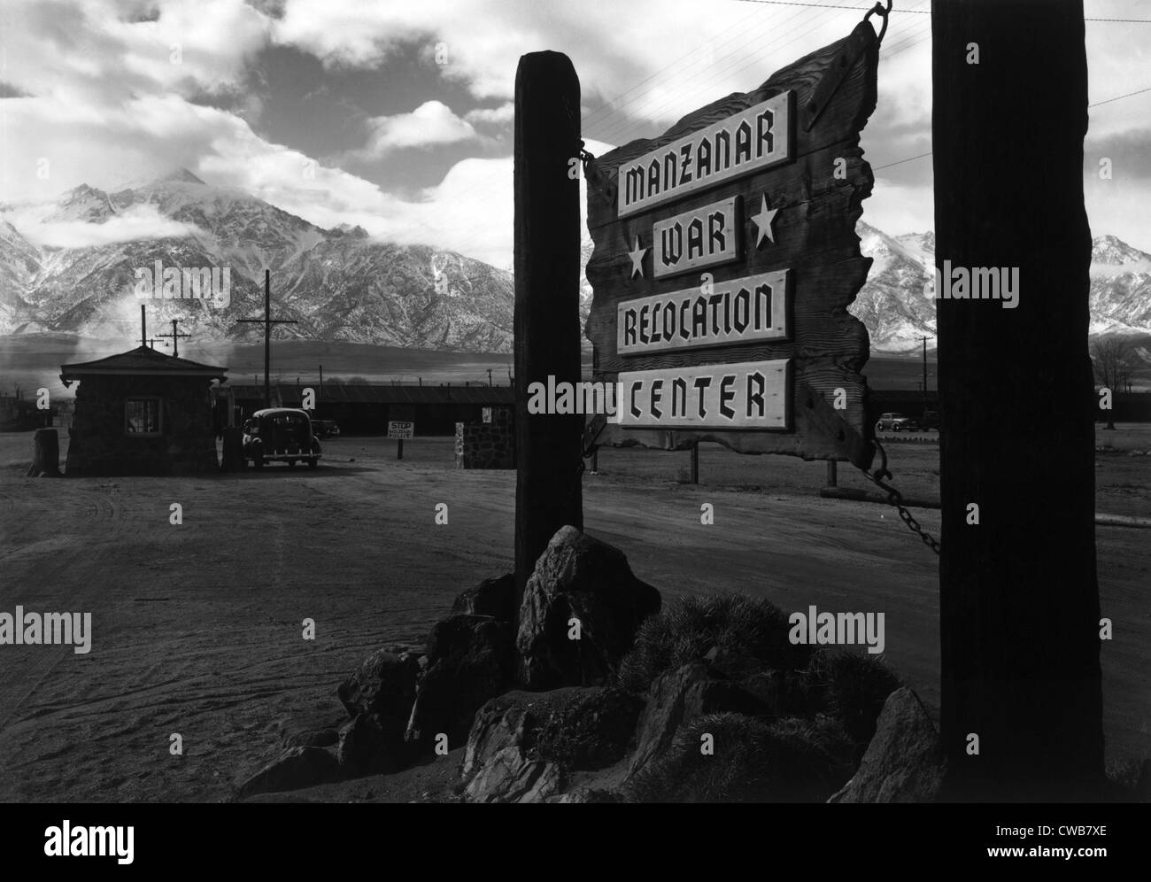 World War II, Wooden sign at entrance to the Manzanar War Relocation Center, California. photograph by Ansel Adams. 1943 Stock Photo