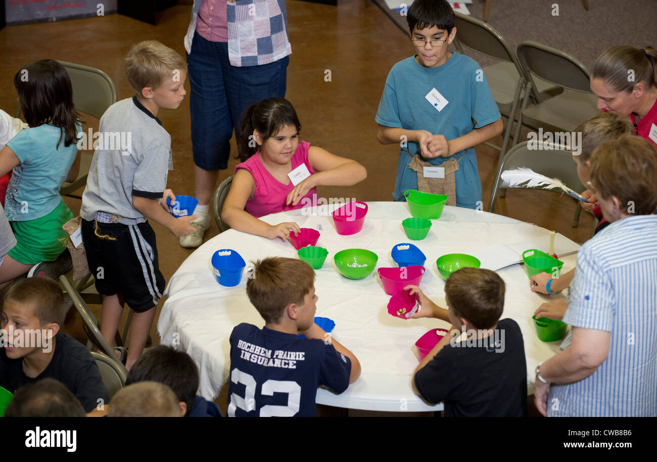 Adult volunteers teach lesson about social versus individual rights to