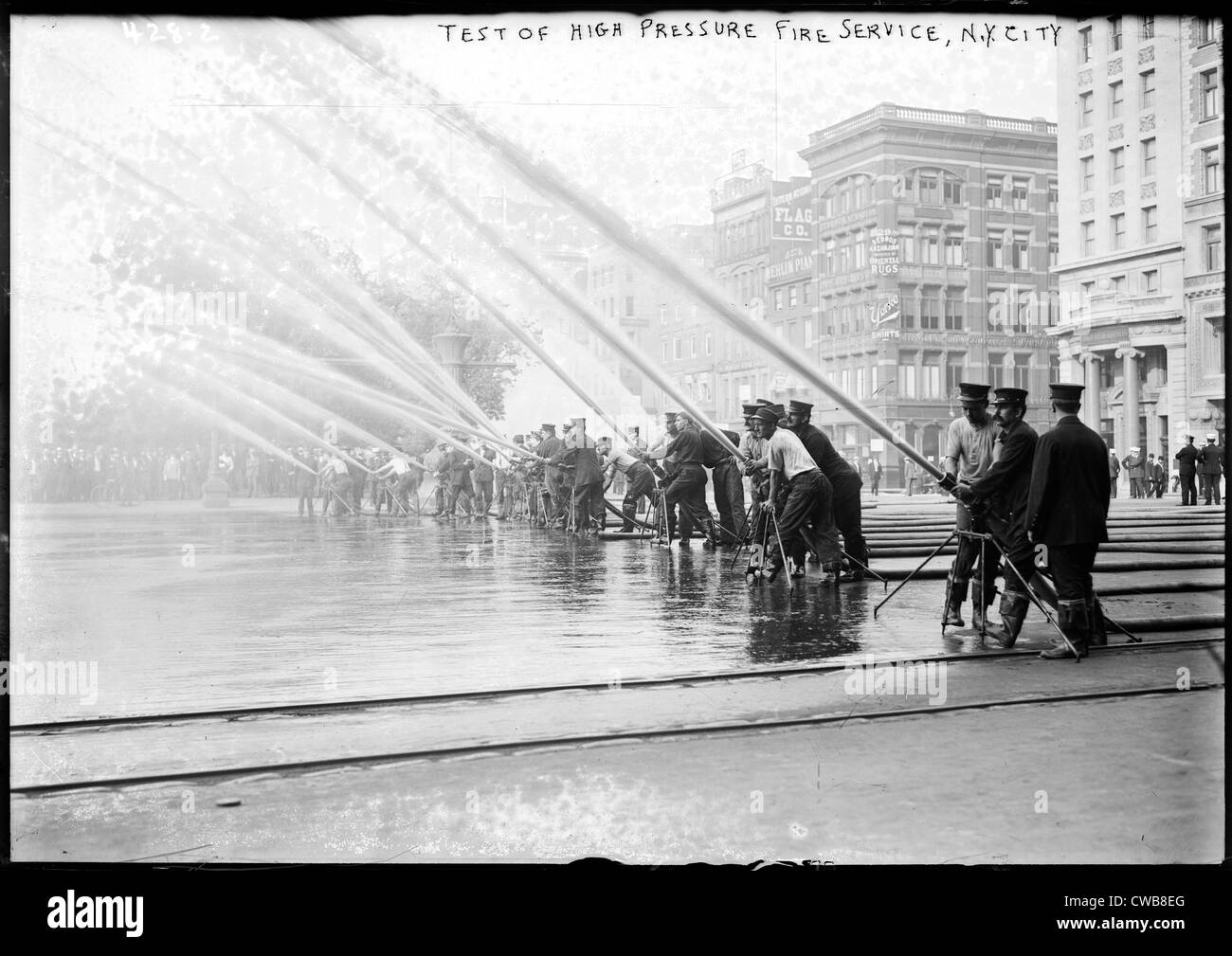 Fireman testing high-pressure hoses, New York City New York, 1900-1910 Stock Photo