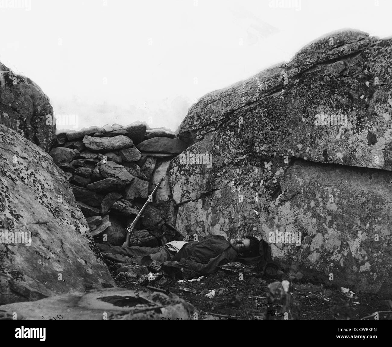 The Civil War. The Battle of Gettysburg. The Home of a Rebel Sharpshooter. A Dead Confederate soldier in Devil's Den, Stock Photo