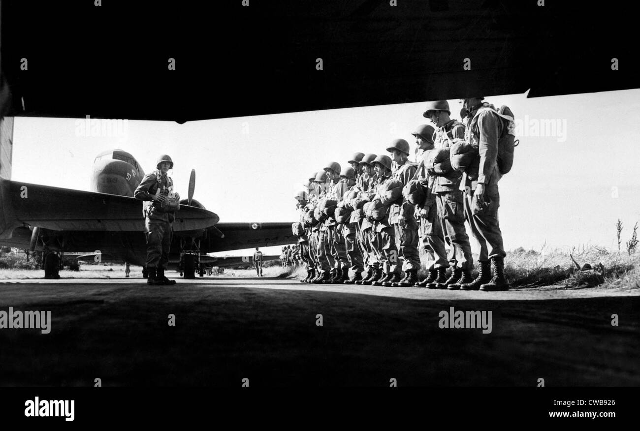 U.S. paratroopers lining up before taking off on training maneuvers somewhere in England, ca. 1942 Stock Photo