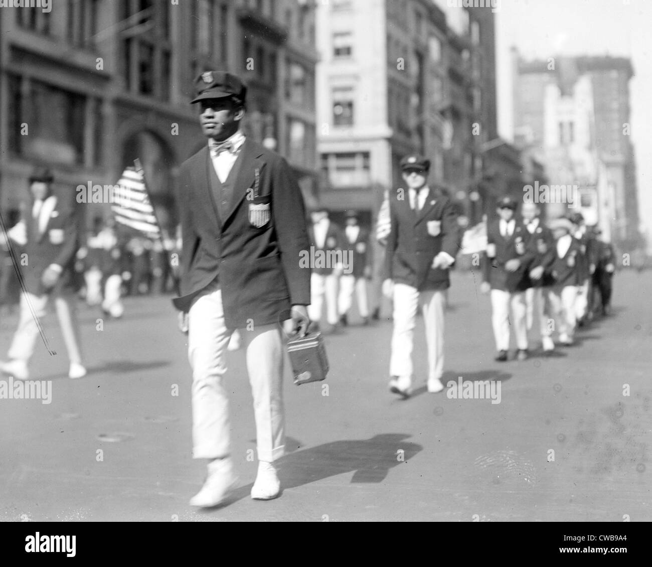 Kahanamoku, aka Duke Kahanamoku marches in Olympic Parade, c. 1920 Stock Photo