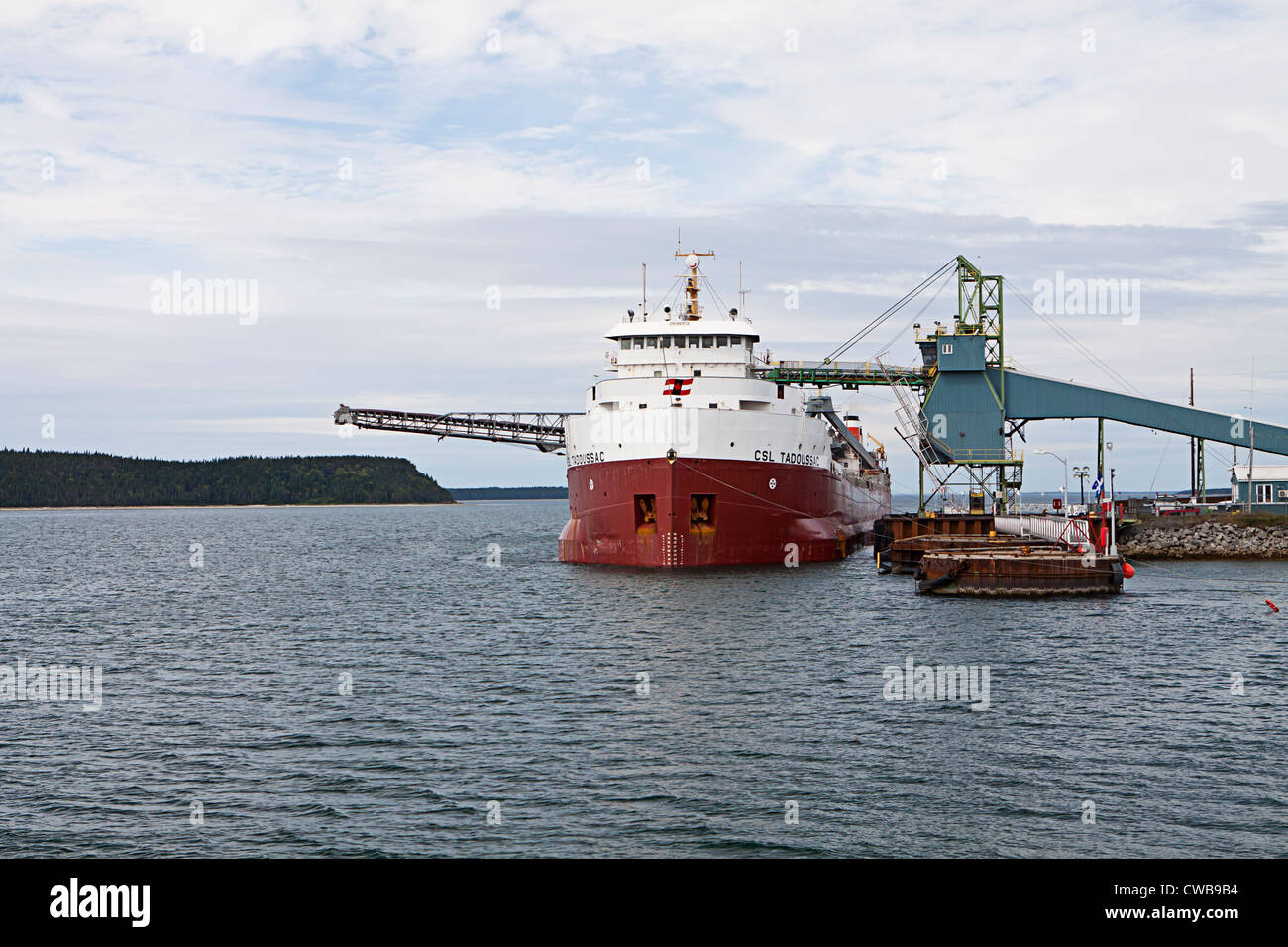 Bulk carrier CSL Tadoussac in Havre St Pierre loading titanium ore Stock Photo