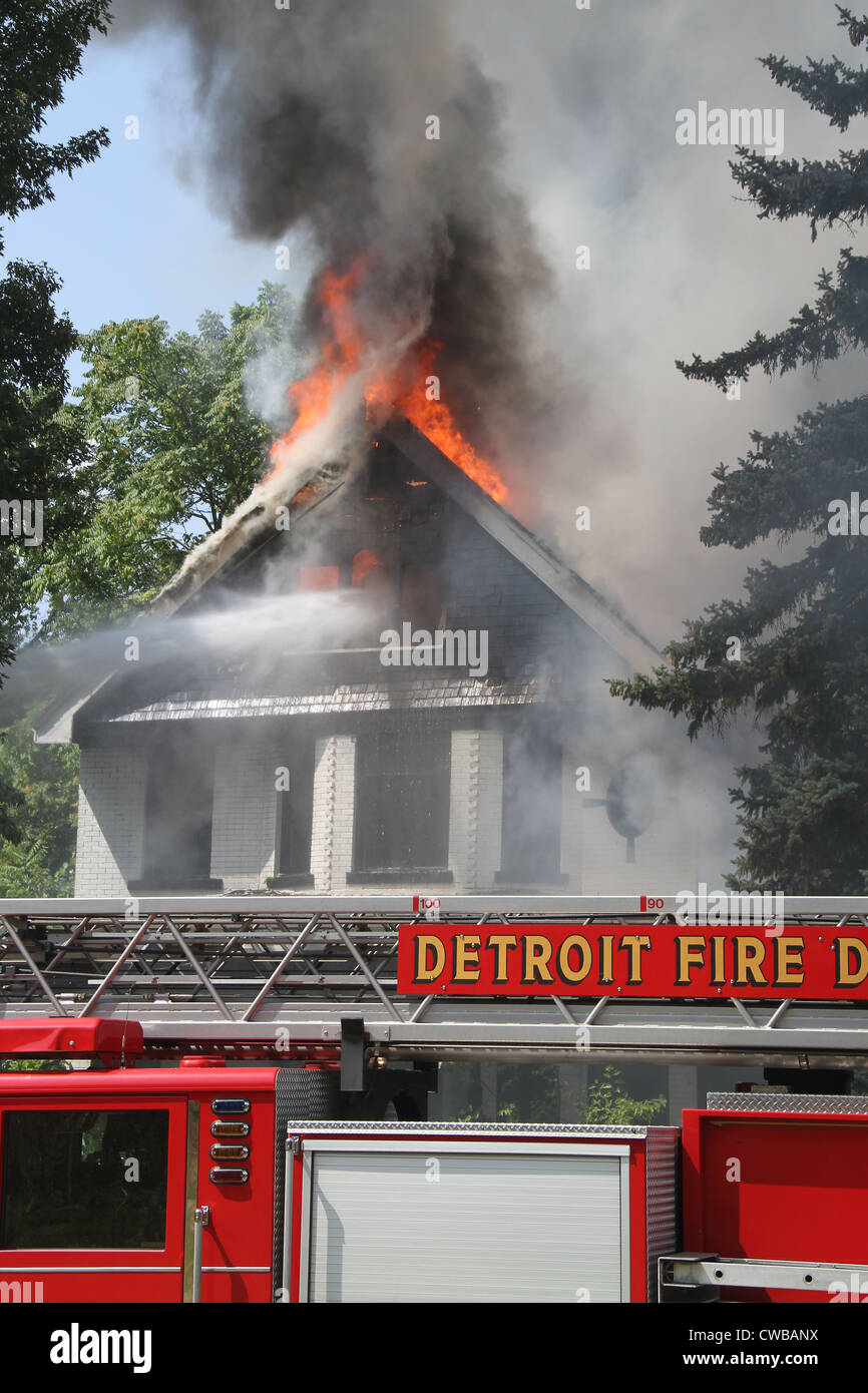 Detroit Fire department at scene of vacant dwelling fire Detroit Michigan USA Stock Photo