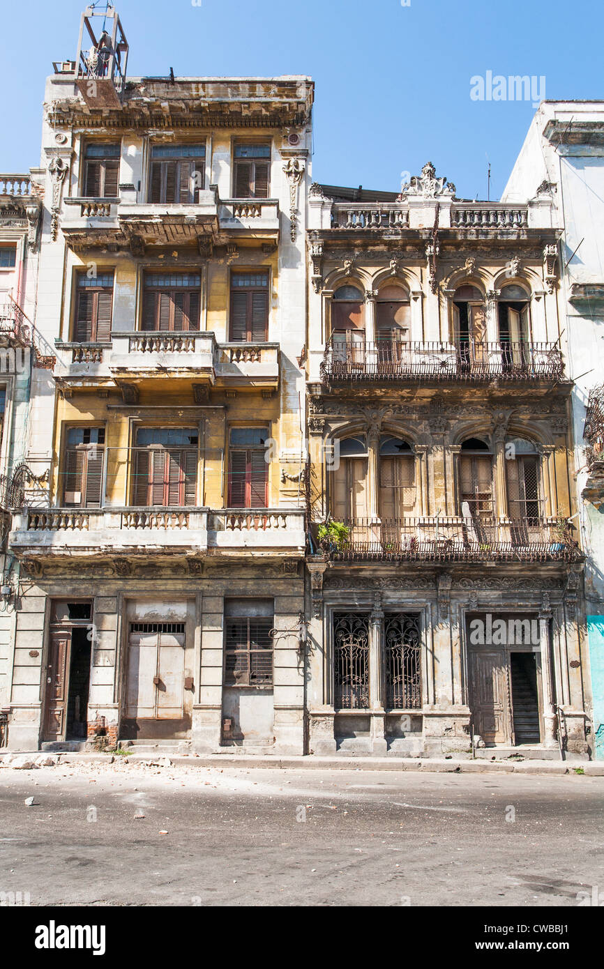Old dilapidated building in traditional colonial style in central Havana, Cuba Stock Photo