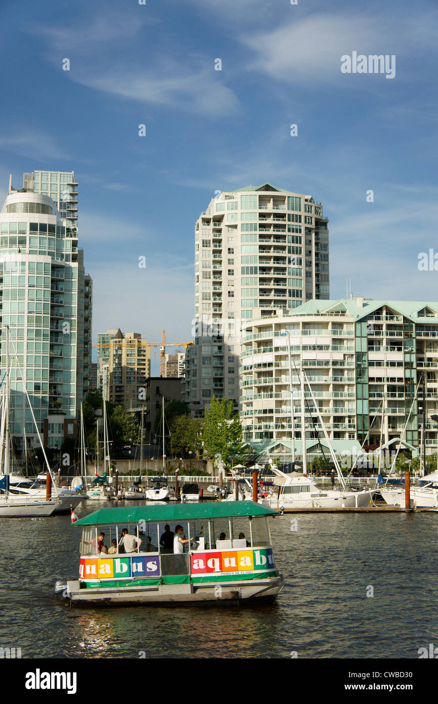 Tourists riding in the aquabus harbour tour boat, Granville Island, Vancouver, British Columbia, Canada Stock Photo