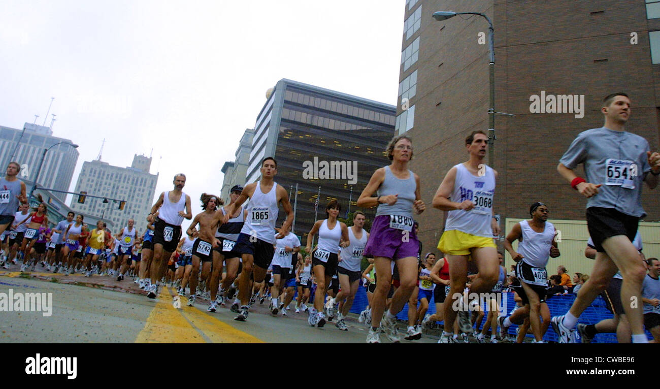 Runners participate in the Crim road race in Flint, MI. Stock Photo