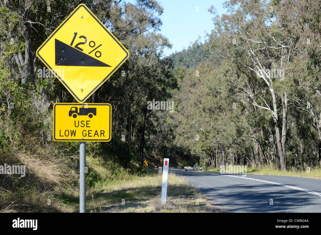 Warning road sign Steep Hill ahead. Queensland Australia Stock Photo