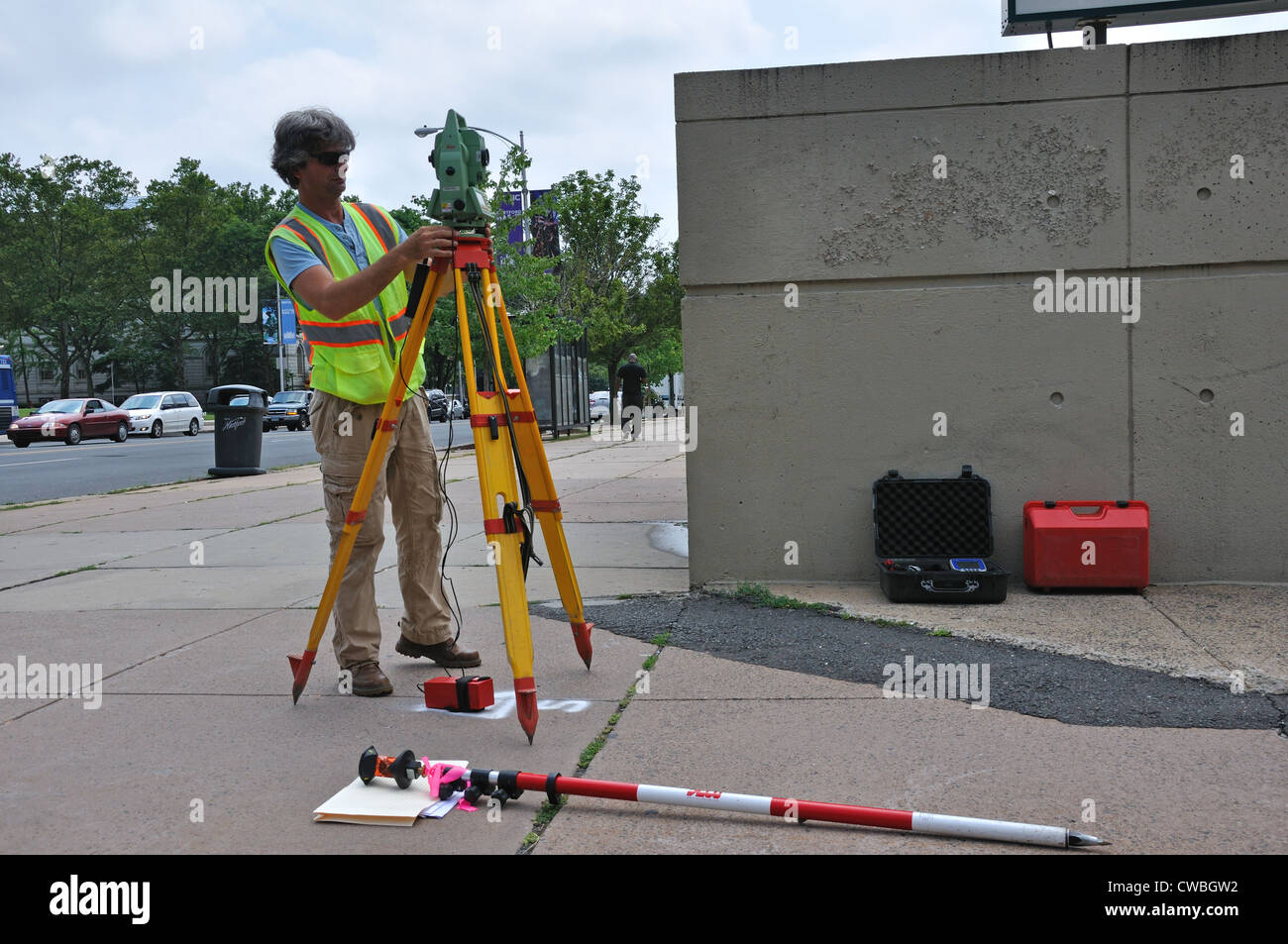 Surveyor surveying property lines or boundaries Stock Photo Alamy
