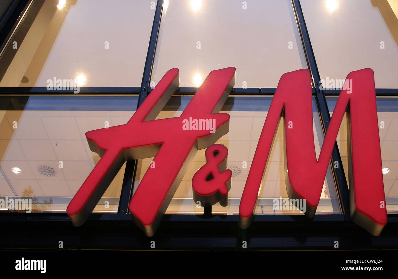 Logo on a business of fashion chain H & M Stock Photo